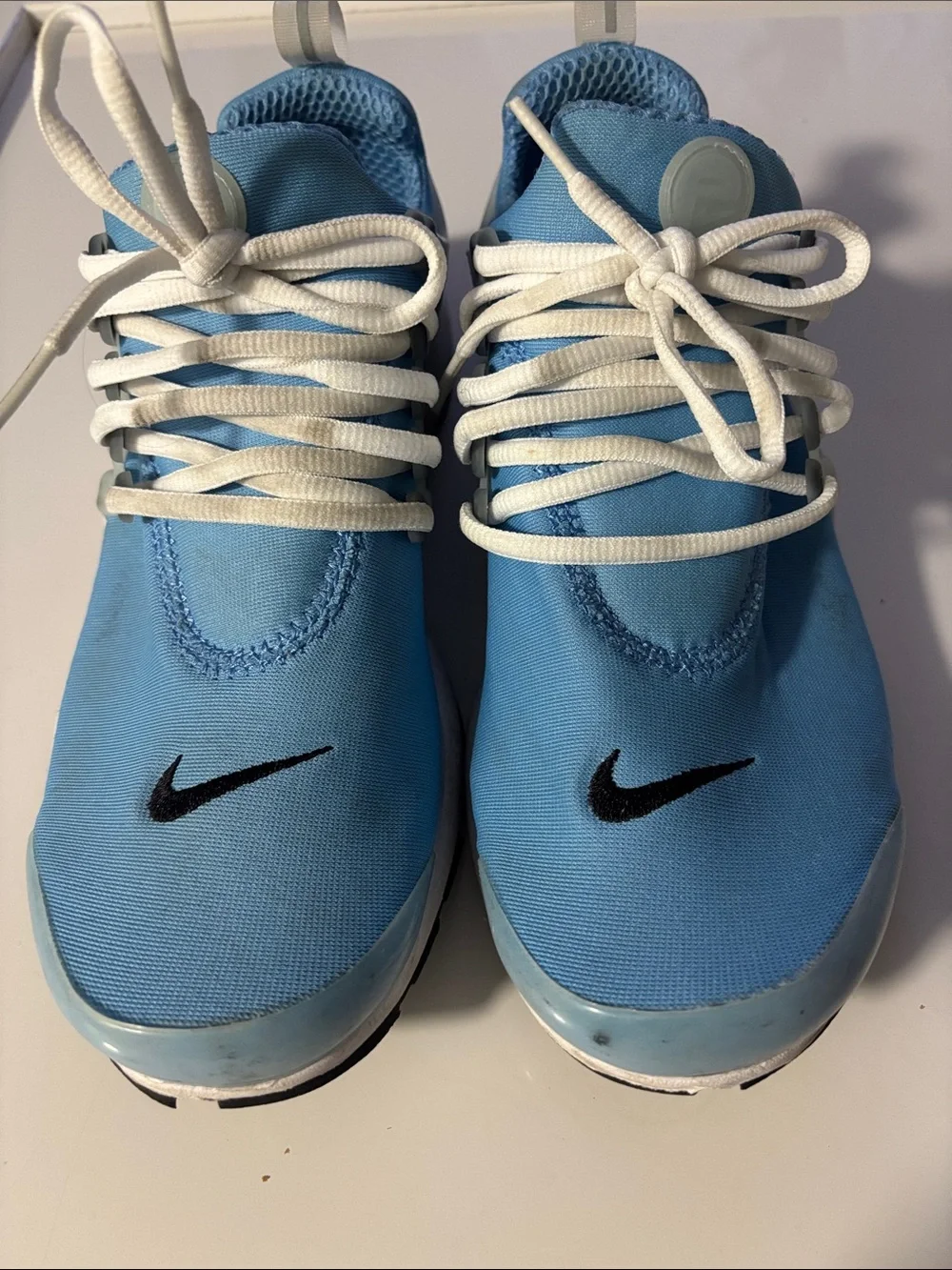 Men’s Nike  Light Blue and White Athletic Sneakers with Black Swoosh